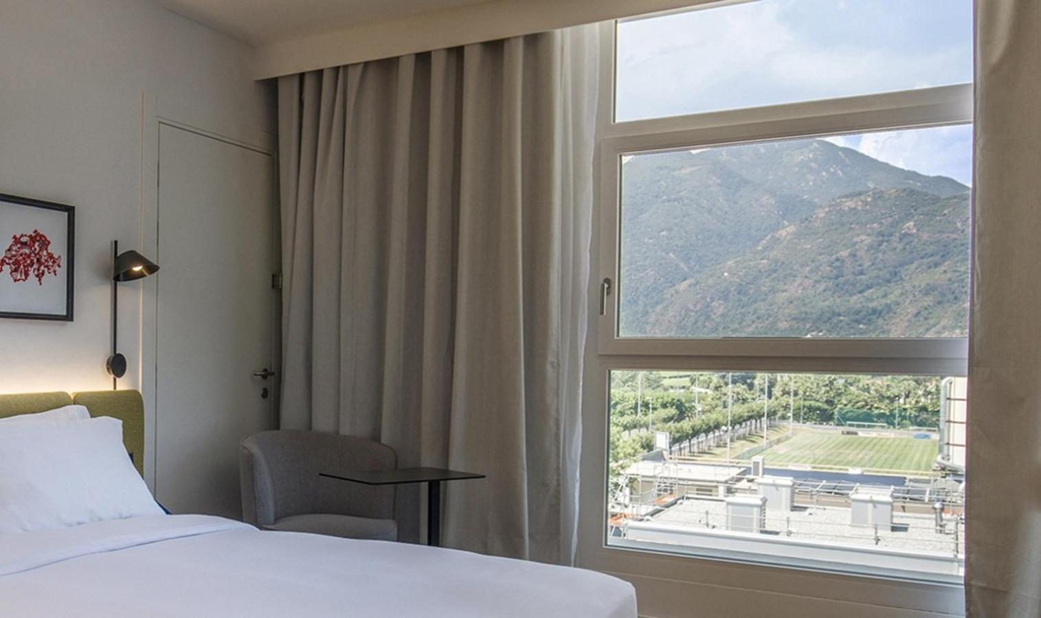 Hotel Hampton By Hilton Locarno à Losone Extérieur photo
